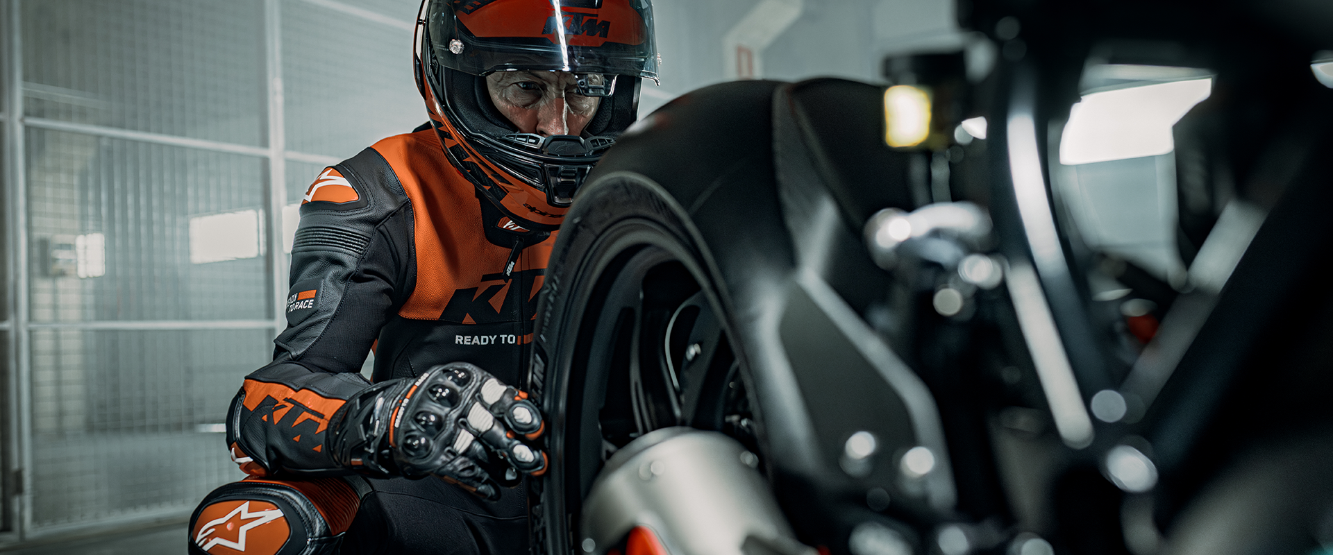 GLOVES ON. VISOR DOWN